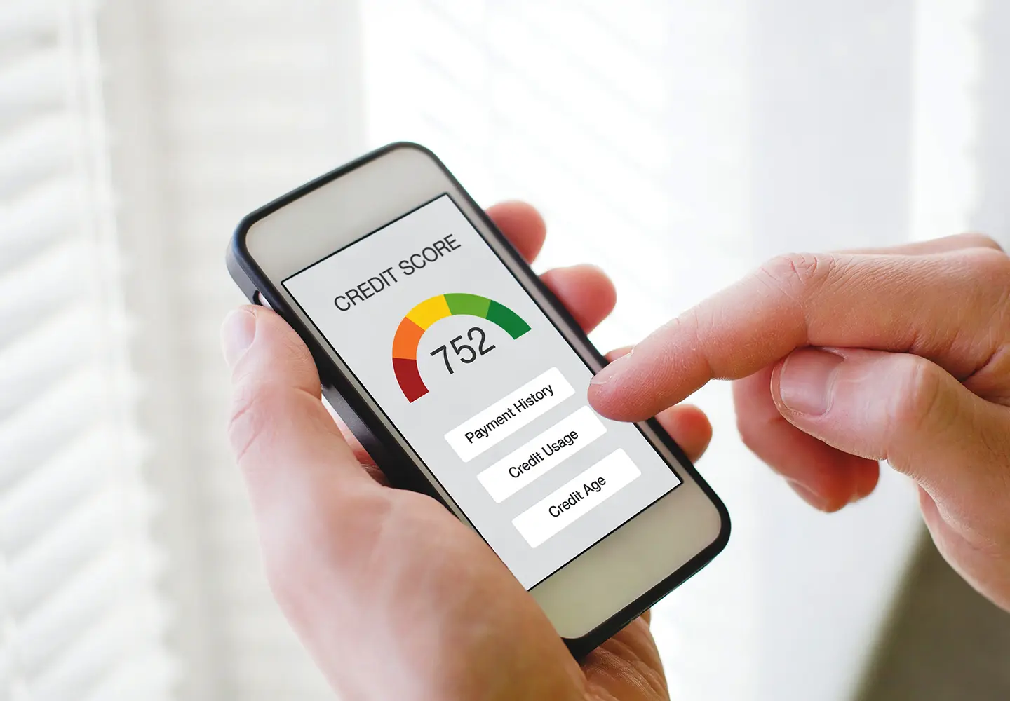 A mobile showing a credit score.